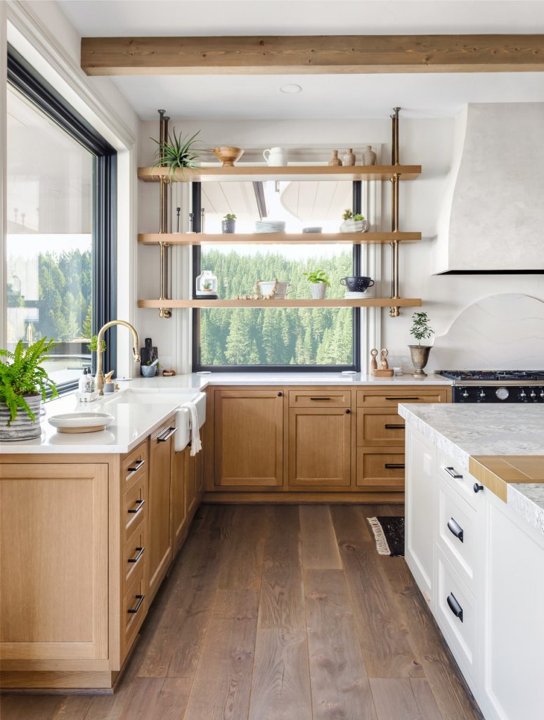 Beautiful Kitchen In New Luxury Home With Island Pendant Lights