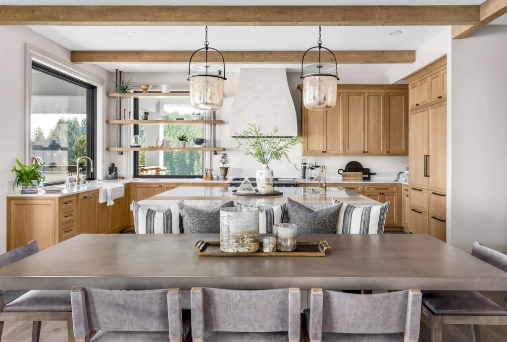 Beautiful Kitchen In New Luxury Home With Island Pendant Lights